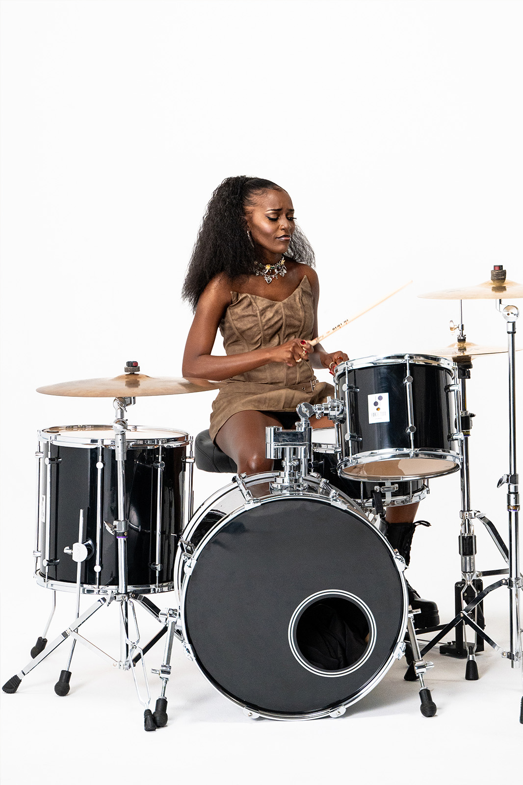 Becky Sangolo playing drums