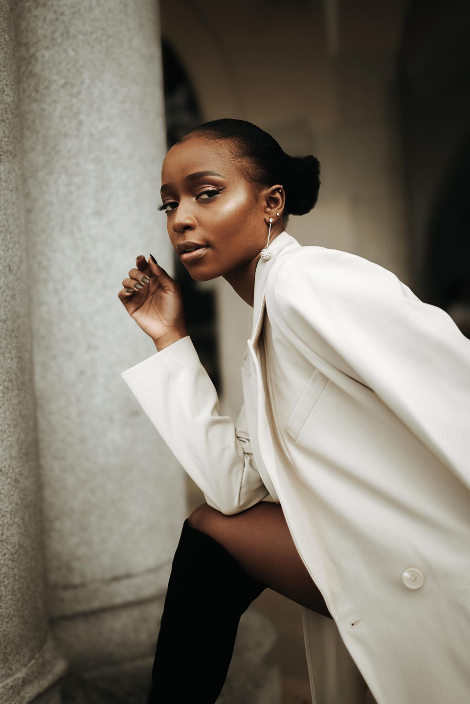 Becky Sangolo stylish white blazer portrait